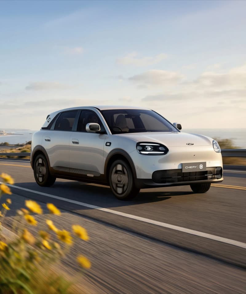 Chery Q driving on a coastal road