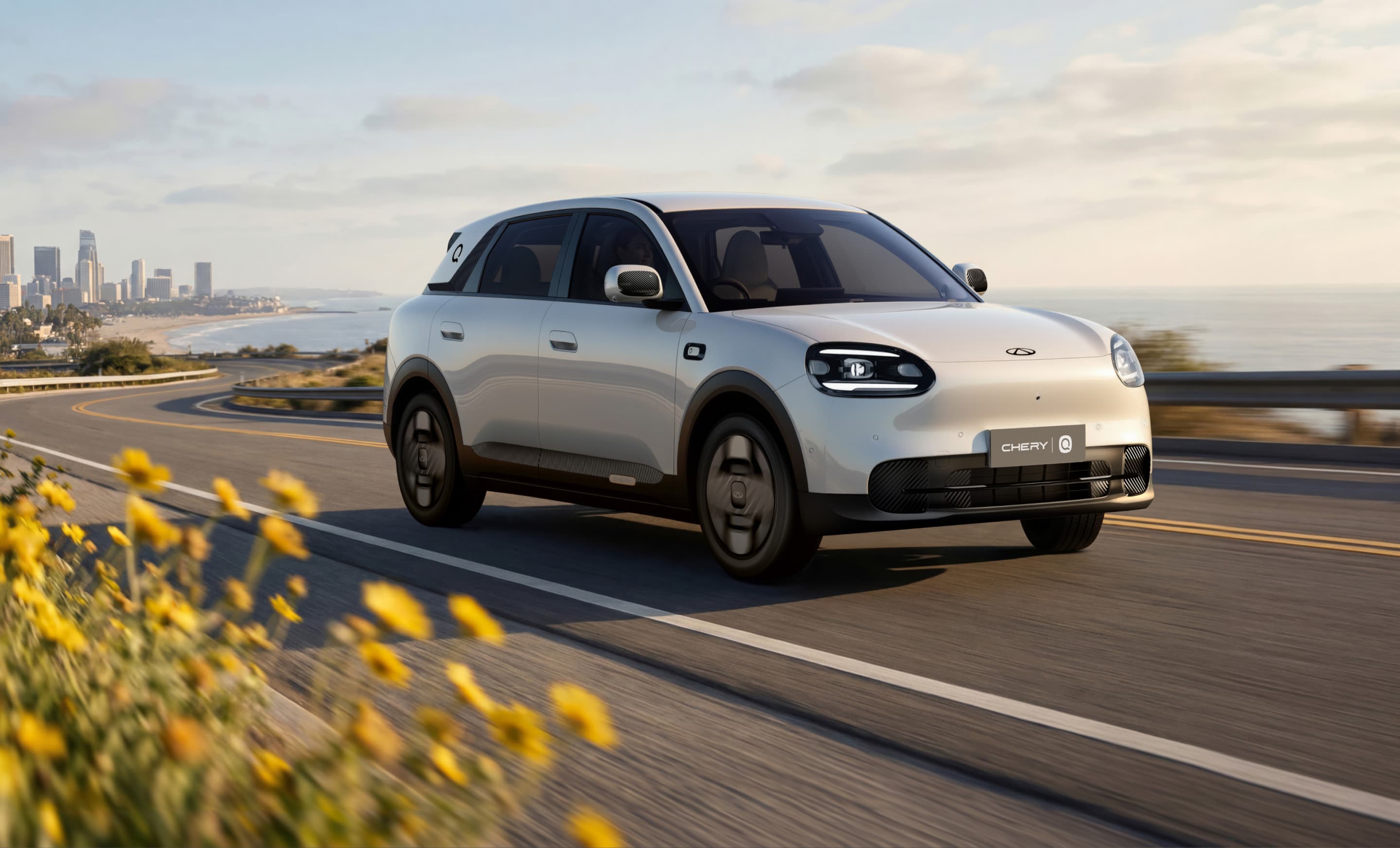 Chery Q driving on a coastal road